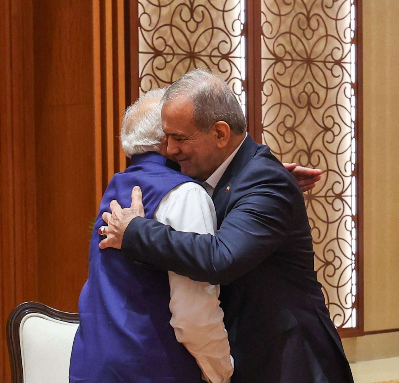 Prime Minister Narendra Modi hugs Iranian President Masoud Pezeshkian during BRICS Summit-related engagements at Bharat Mandapam, in New Delhi, India, on Sunday. ( PMO)