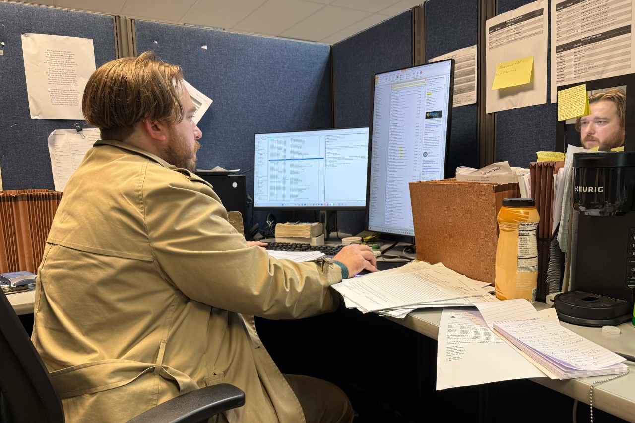 Markus Johnson, an investigator with the Richland County Sheriff's Department, in his office cubicle. Markus Johnson, an investigator with the Richland County Sheriff's Department, in his office cubicle.