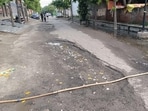 “The authorities should repair the roads, fix the broken drain covers and resolve the sewage overflow,” said Ashok Chauhan, vice-president, RWA Sector 130. (HT Photo)