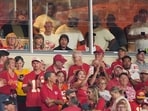 Taylor Swift, center left, sits with Tom Cruise, center, while watching the first half of an NFL football game between the Kansas City Chiefs and the Denver Broncos in Kansas City, Mo.(AP Photo/Charlie Riedel)
