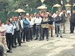 Members of Himachal Pradesh University Teachers’ Welfare Association outside the V-C’s office during a protest.