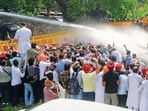 Party turns up heat on AAP govt over Sangrur ‘suicide’, presses for Cheema’s resignation; PPCC chief, Channi share stage after months. (HT PHOTO)