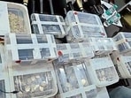 The boxes of coins seized by Saharanpur police. (HT Photo) The boxes of coins seized by Saharanpur police. (HT Photo)