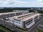 An aerial view of a data center operated by Amazon AWS IAD is seen on August 25, 2026 in Sterling, Virginia. Anna Moneymaker/Getty Images/AFP (Photo by Anna Moneymaker / GETTY IMAGES NORTH AMERICA / Getty Images via AFP)(Getty Images via AFP)