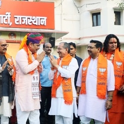 Rajasthan Chief Minister Bhajanlal Sharma greets state BJP President Madan Rathore as they celebrate the results of the Rajasthan Civic Polls 2026  at the BJP office, in Jaipur.