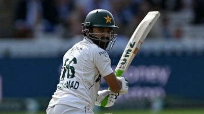 Pakistan's Mohammad Rizwan watches his shot go to the boundary on day two of the second test match between England and Pakistan at Lord's (AFP)