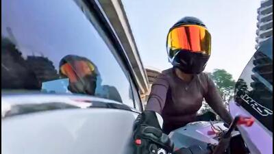 Footage appeared to show a car swerving towards Sia and hitting her motorcycle.