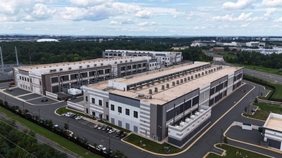 An aerial view of a data center operated by Amazon AWS IAD is seen on August 25, 2026 in Sterling, Virginia. Anna Moneymaker/Getty Images/AFP (Photo by Anna Moneymaker / GETTY IMAGES NORTH AMERICA / Getty Images via AFP) (Getty Images via AFP) An aerial view of a data center operated by Amazon AWS IAD is seen on August 25, 2026 in Sterling, Virginia. Anna Moneymaker/Getty Images/AFP (Photo by Anna Moneymaker / GETTY IMAGES NORTH AMERICA / Getty Images via AFP) (Getty Images via AFP)