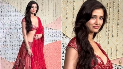 Disha Patani arrived in her signature red bralette blouse, paired with a beautifully embroidered lehenga skirt and a matching dupatta draped elegantly to the side. (Instagram)