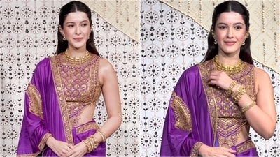 Shanaya Kapoor served a stunning dose of elegance in a purple ethnic ensemble featuring intricate golden zari borders. She completed the traditional look with statement gold jewellery. (Instagram)