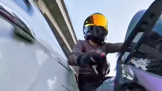 The woman was riding with a group when the Maruti Suzuki Ciaz allegedly chased her and swerved into her motorcycle on Golf Course Road early Sunday. (Screengrab)
