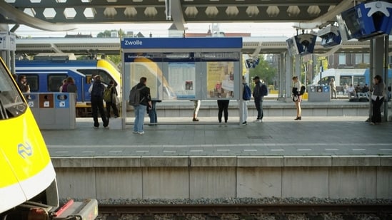 People gather on a train platform after suspected sabotage disrupted Dutch train services, in Zwolle, Netherlands, in this screengrab taken from a video released on September 15, 2026. 