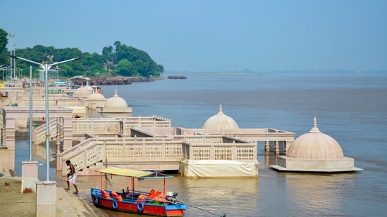 A view of the swollen Ganga river partially submerging the Vindhya Ki Pauri Ghat at Vindhyachal Dham, in Mirzapur district, Uttar Pradesh, on September 14