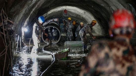The six workers have remained trapped since the August 26 floods, with rescue teams working to reach the underground power station where they were last seen.