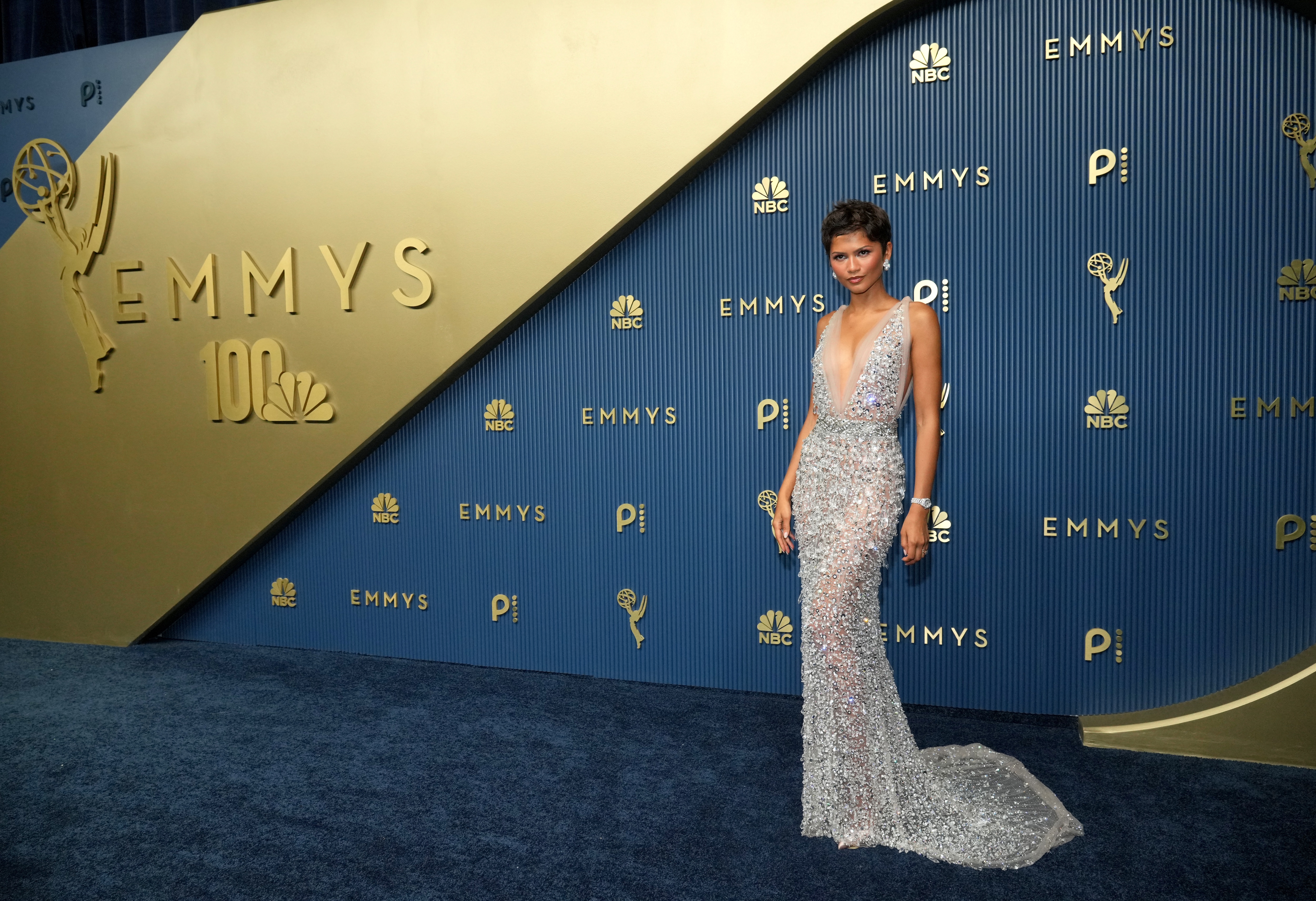 Zendaya wore a sheer sparkly Prada gown with a pixie cut. (AP) Zendaya wore a sheer sparkly Prada gown with a pixie cut. (AP)