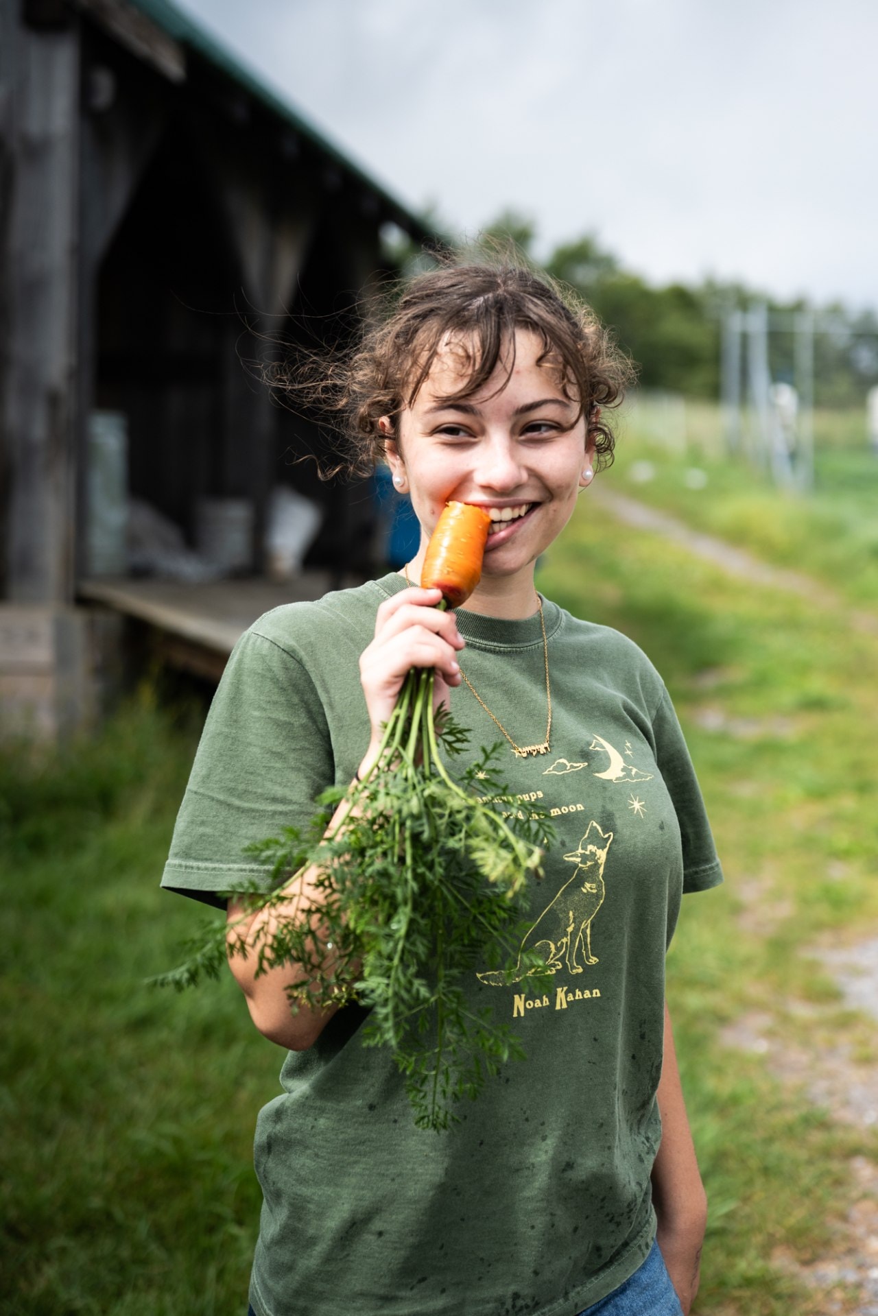 Scott takes a break from farm work to pick a carrot. ‘It tastes better with the dirt still on it.’ Scott takes a break from farm work to pick a carrot. ‘It tastes better with the dirt still on it.’