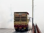 According to police, the incident took place at around 1pm, when the truck was heading towards Sector 18 on the Noida Elevated Road. (Sunil Ghosh/HT Photo)