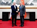 China's foreign minister Wang Yi said Beijing was willing to "safeguard" Iran's rights during talks with his counterpart Abbas Araghchi. 