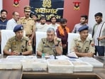 Police officials holding a press conference in Mathura on Tuesday. (HT Photo)