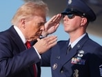 President Donald Trump salutes as he boards Air Force One, Wednesday, Sept. 16.