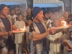 Arpita Khan corrects brother Salman Khan during aarti.