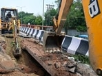 While no injuries were reported, Noida authority officials, aware of the development, requesting anonymity said they will fix the caved-in part by Wednesday morning. (Sunil Ghosh/HT Photo)