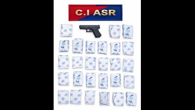 Counter Intelligence (CI) Amritsar intercepted a cross-border smuggling network on Wednesday, arresting four men and seizing 27kg of heroin, a foreign-made .30-bore PX5 pistol, and three cartridges. (X) Counter Intelligence (CI) Amritsar intercepted a cross-border smuggling network on Wednesday, arresting four men and seizing 27kg of heroin, a foreign-made .30-bore PX5 pistol, and three cartridges. (X)