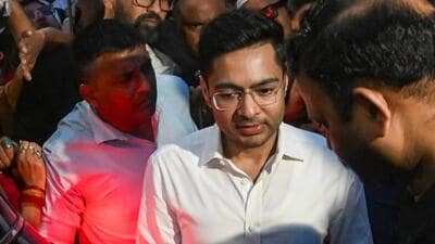 Earlier in August, a scuffle broke out between TMC leaders and workers and the police when a Kolkata Municipal Corporation team removed an allegedly unauthorised TMC billboard from the building where Banerjee’s office is located. (PTI) Earlier in August, a scuffle broke out between TMC leaders and workers and the police when a Kolkata Municipal Corporation team removed an allegedly unauthorised TMC billboard from the building where Banerjee’s office is located. (PTI)