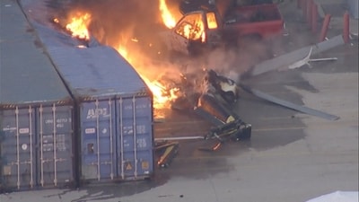 An aerial view shows the burning wreckage of an NBC News helicopter that crashed while covering a report of a deadly Metro bus collision, resulting in multiple casualties, in Chatsworth, Los Angeles (REUTERS)