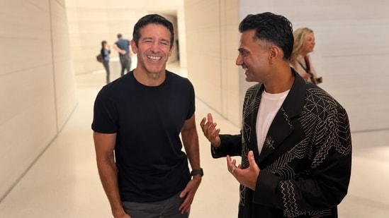 Anand Ahuja with Apple CEO John Ternus at Apple Park, discussing Apple’s latest products and the company’s approach to design and innovation.