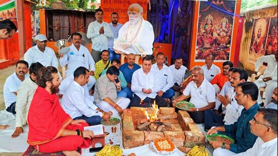 Special prayers being offered on the eve of Prime Minister Narendra Modi’s birthday in Varanasi on Wednesday. (HT Photo)