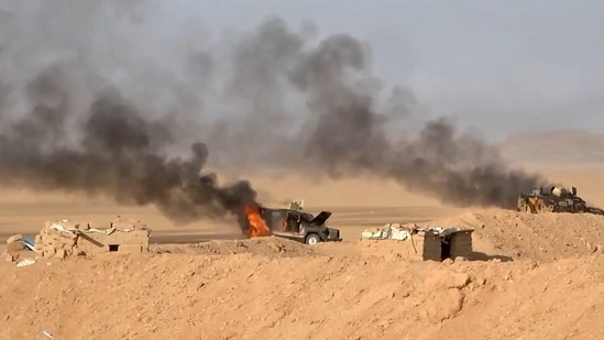 This handout picture released on September 15, 2026 by Ansarullah Media Centre reportedly shows burning military vehicles that they targeted in al-Jawf. The Houthis have been engaged in renewed fighting with Saudi-backed government forces since Yemen's civil war reignited in July, when the group declared a maritime blockade on Riyadh and began targeting its ships in the Red Sea.