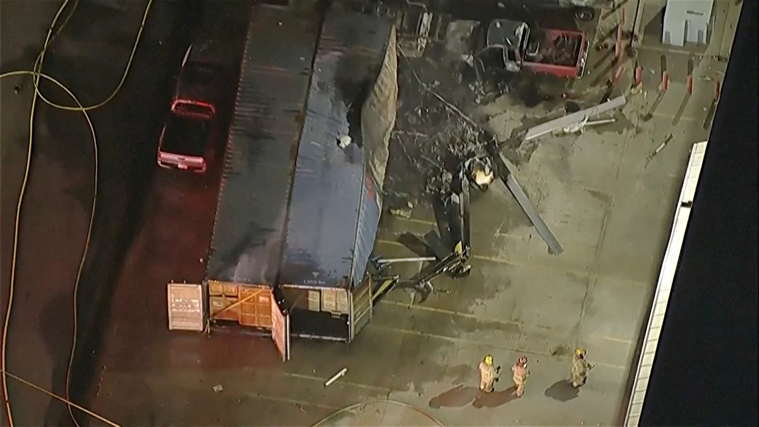 An aerial view shows the wreckage of an NBC News helicopter that crashed while covering a report of a deadly Metro bus collision, resulting in multiple casualties, in Chatsworth, Los Angeles (REUTERS)