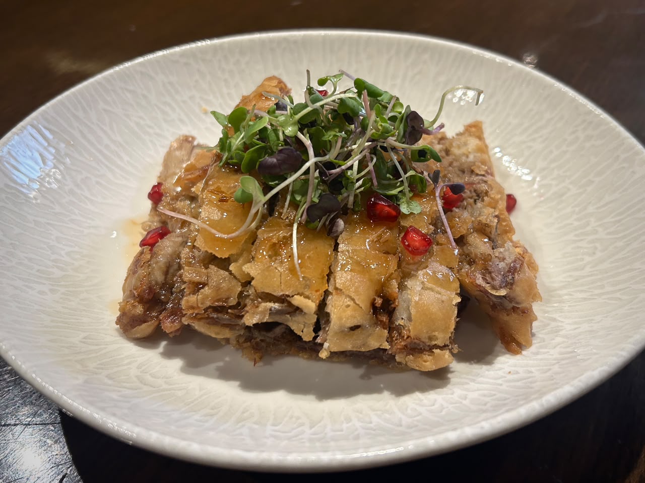 The decadent and juicy crispy duck with plum sauce. (Author: Krishna Priya Pallavi) The decadent and juicy crispy duck with plum sauce. (Author: Krishna Priya Pallavi)