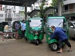 An autorickshaw driver pulls his vehicle after filling it with CNG at a fuel station amid fuel shortage, in Dhaka, Bangladesh, August 26, 2026. 