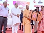 Chief minister Yogi Adityanath during a programme at Indira Gandhi Pratishthan in Lucknow on Vishwakarma Jayanti and Prime Minister Narendra Modi’s birthday. (HT)