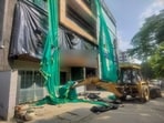 Officials also sealed buildings housing a gaming zone, warehouse, offices and guest houses, while residents including foreign nationals were asked to vacate. (HT)
