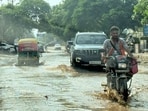 Pumping provides only temporary relief, residents say, as stagnant water damages RMC roads and forces vendors onto footpaths around the busy intersection. (HT)