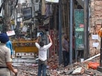 MCD Workers demolish the 'Dangerous' building Adjacent of collapsed PG at Satya Niketan. MCD Workers demolish the 'Dangerous' building Adjacent of collapsed PG at Satya Niketan.