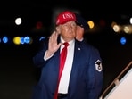 President Donald Trump waves as he arrives on Air Force One, Wednesday, Sept. 16, 2026, at Joint Base Andrews, Md. (AP Photo/Alex Brandon)