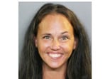 Malia Nummerdor faces a felony charge after investigators said surveillance footage showed alleged sexual activity involving her and the family dog.