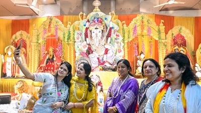 Gram it: The festive fervour is in full swing as devotees turn up at Ganesh pandals across Delhi-NCR to seek Lord Ganesha’s blessings. At a pandal in Kavi Nagar, Ghaziabad, women were seen getting clicked with Bappa, capturing a joyous moment from the celebrations. (Photo: ANI)