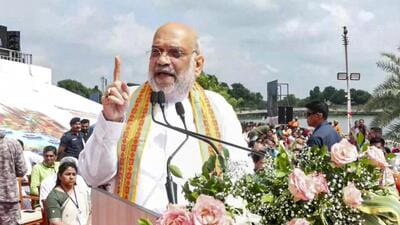 Amit Shah flagged off a motorcycle rally from Vadnagar to Varanasi as part of a campaign marking PM Modi’s 25 years in public office (PTI)