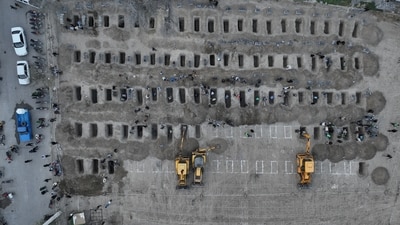 Graves prepared for the victims of the strike on a school in Minab, Iran. (File Photo/via REUTERS)