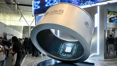 Visitors gather around an installation displaying microprocessor chips during the SEMICON India 2026 Conference & Expo on the semiconductor and electronics ecosystem at Yashobhoomi Convention Centre in New Delhi on September 17, 2026. (AFP) Visitors gather around an installation displaying microprocessor chips during the SEMICON India 2026 Conference & Expo on the semiconductor and electronics ecosystem at Yashobhoomi Convention Centre in New Delhi on September 17, 2026. (AFP)