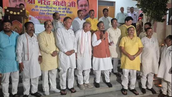 BJP national general secretary and UP in-charge Vinod Tawde with party leaders and workers during a programme in Gorakhpur on Thursday. (Sourced)