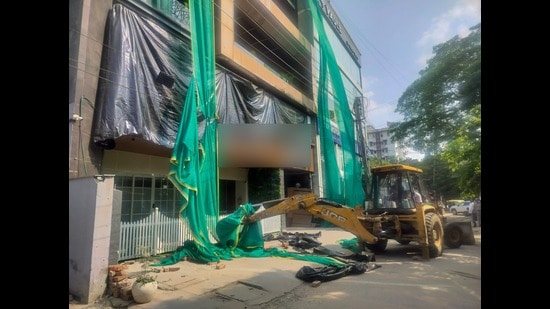 Officials also sealed buildings housing a gaming zone, warehouse, offices and guest houses, while residents including foreign nationals were asked to vacate. (HT)