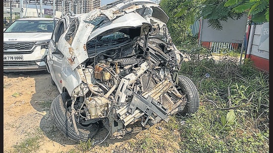 The mangled remains of car that crashed at Dwarka Expressway divider, Sector 110, Gurugram, on Thursday. (PARVEEN KUMAR/HINDUSTAN TIMES)