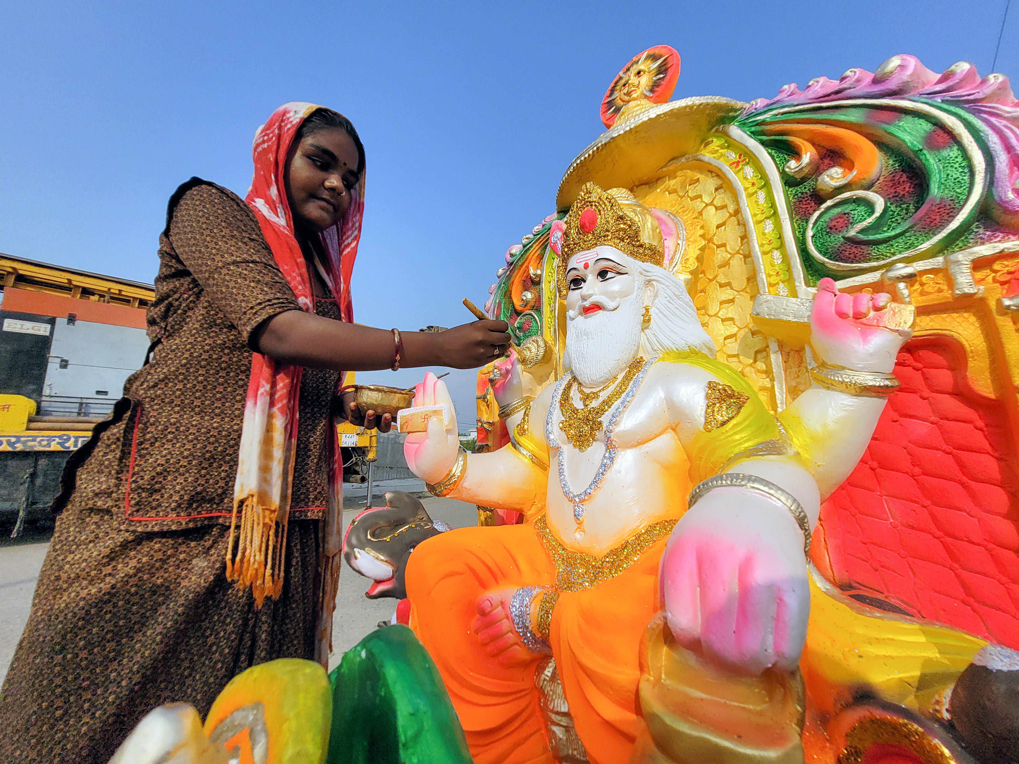 An artist gives final touches to an idol of Vishvakarma ahead of the Vishwakarma Puja in Samba on September 16. (ANI) An artist gives final touches to an idol of Vishvakarma ahead of the Vishwakarma Puja in Samba on September 16. (ANI)