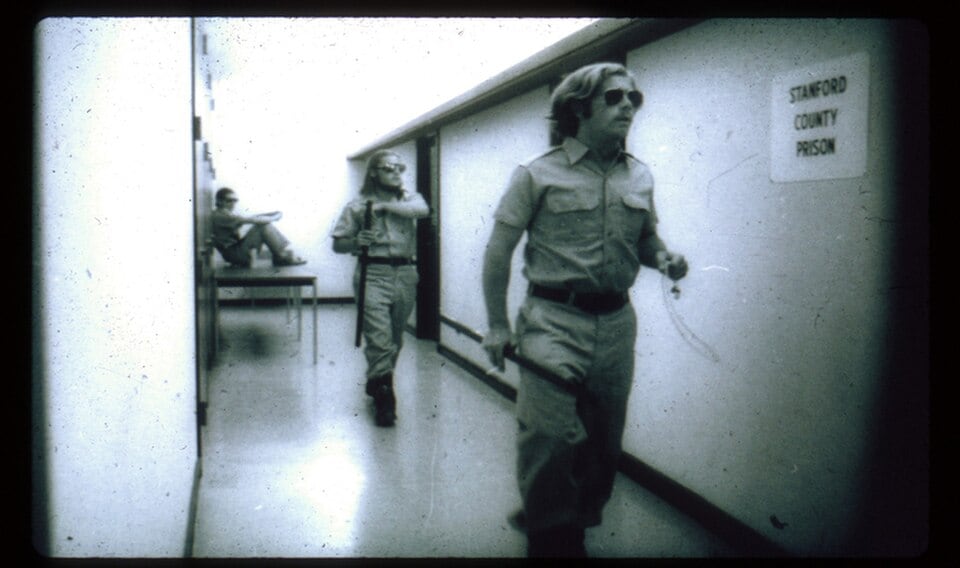 Guards walking the experiment yard, 1971. (Wikimedia Commons) Guards walking the experiment yard, 1971. (Wikimedia Commons)